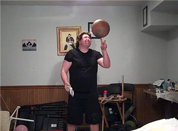 Most Playing Cards Dealt Individually With One Hand While Spinning A Basketball On One Finger
