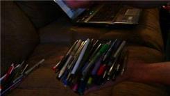 Most Pens Held In One Hand At Once