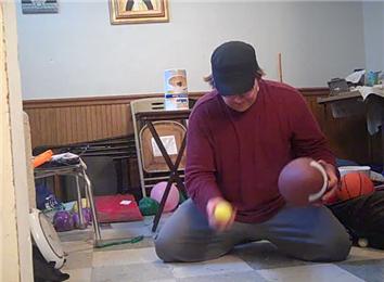 Most Consecutive Times to Dribble an American Football Alternating Hands While Tossing a Tennis Ball Back & Forth Alternating Hands in One Minute