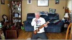 Longest Time To Balance A 22-Caliber Rifle On Chin