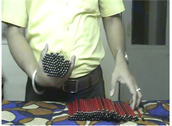Most Pencils Held In Hand