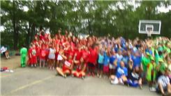 Most Summer Camp Attendees Doing A Fist Pump Simultaneously