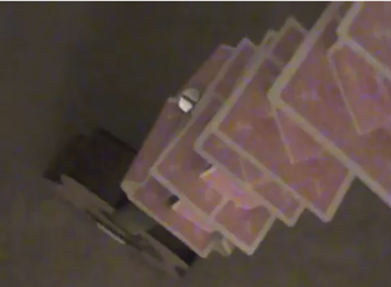 Most Cards Stacked On A Guitar