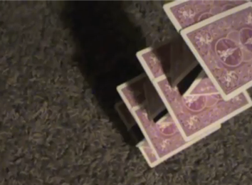 Most Cards Stacked On A Golf Tee