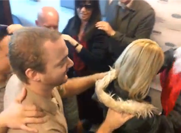 Most People Dancing In A Conga Line Led By Santa Claus