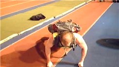 Most Push-Ups On Fists With 100 Pounds On Back In One Minute