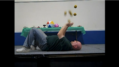 Most Balls Juggled While Lying Down