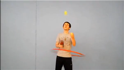 Most Catches Of Three Tennis Balls Using A Tennis Ball Can In One Hand While Hula Hooping