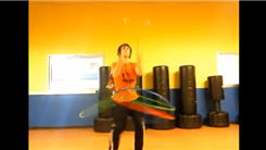 Youngest Person To Juggle Four Balls While Hula Hooping Using Four Hula Hoops