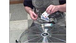 Most Eisenhower Silver Dollar Coin Rolls In 30 Seconds While Spinning A Playing Card On Another Card Using A Fan