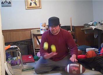 Most Consecutive One Handed Dribbles of an American Football While Juggling Two Tennis Balls in Other Hand in 30 Seconds