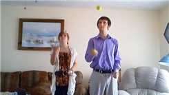 Longest Time Juggling Two Tennis Balls In One Hand While A Female Juggles Three Baseballs