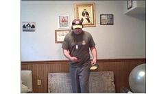 Most Flips Of A Waffle In A Seven Inch Diameter Skillet While Bouncing A Table Tennis Ball On A Paddle In The Other Hand In One Minute