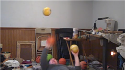 Most Catches Juggling Three Five-Pound Balls While Lying Down