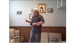 Most Consecutive Golf Ball Bounces On Alternate Sides Of A Rubber Mallet While Spinning A Toothbrush On One Finger