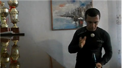 Longest Time Bouncing A Table Tennis Ball On A Bottle Of Coca-Cola Balanced On A Table Tennis Paddle