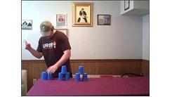 Most Sets Of One-Handed 3-3-3 Speed Stacking While Spinning A Toothbrush In The Other Hand In 30 Seconds