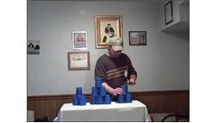 Most Sets Of One-Handed 3-6-3 Speed Stacking While Bouncing A Table Tennis Ball On A Paddle In One Minute