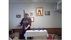 Most Sets Of One-Handed 3-3-3 Speed Stacking While Balancing A Baseball Bat On Two Fingers In One Minute