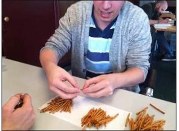 Most Pretzels Sticks Stuck Out Of Mouth