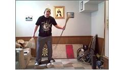 Most Bounces Of A Golf Ball Between Two Brooms While Balanced On A Rola Bola