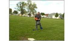 Fastest Time To Walk 100 Yards While Wearing Swim Fins And Spinning A Basketball On Finger