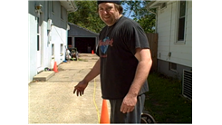 Fastest Time To Walk 100 Yards While Wearing Swim Fins And Carrying 55-Pound Dumbbells In Each Hand