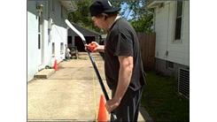 Fastest Time To Walk 100 Yards While Wearing Swim Fins And Balancing A Street Hockey Puck Upright On A Street Hockey Stick