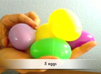 Most Plastic Easter Eggs Held In One Hand