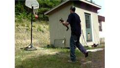 Most Right-Handed Basketball Shots Made While Holding A Mounted Squirrel In Left Hand