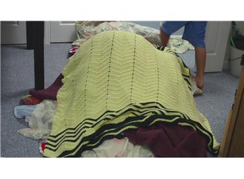 Most Blankets Piled On A Person