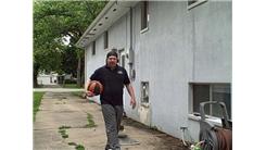 Most Consecutive One-Handed Bounces Of Two Basketballs Off Of The Side Of A Building While On A Rola Bola