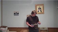 Most Table Tennis Bounces On A Rubik's Cube While Palm Spinning Three Fushigi Balls