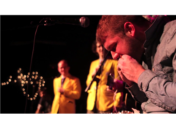 Most Chicken Wings Eaten While A Former Co-Worker Sings A Song About Snow