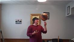 Most One-Handed Revolution Card Cuts While Spinning A Basketball On One Finger