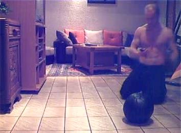 Fastest Time To Complete 100 One-Armed Push-Ups On A Medicine Ball