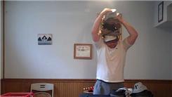Most Hats Put On In Fifteen Seconds
