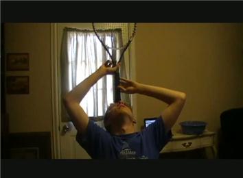 Longest Time To Balance A Tennis Racket On Forehead