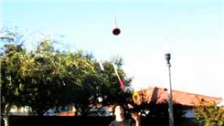 Most Catches Made While Juggling A Rubber Chicken, Brush, Pan, Tennis Racket And A Plunger