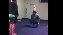 Most Plastic Sipper Cups Balanced On Head While Crouching In A Washing Basket