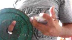 Most Reverse Revolution Card Cuts In 30 Seconds While Holding A 15-Pound Exercise Plate With Index Finger
