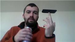 Longest Time Balancing A Cell Phone On Middle Finger While Drinking A Beer