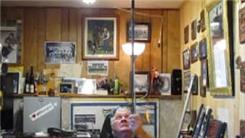 Longest Time To Balance A Bowie Knife On Top Of A Golf Club Handle On Chin