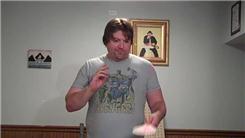 Most Consecutive Coin Rolls With A Silver Dollar In One Minute While Using A Paddle Ball In The Other Hand 