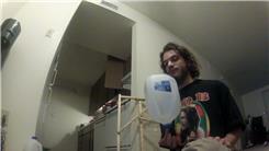 Longest Time To Balance A One-Gallon Jug On Fingertip