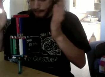 Most Lighters Balanced On One Upright Lighter