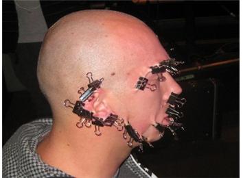 Most Binder Clips Attached To Face
