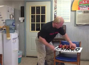 Fastest Time To Break 20 Apples In Half With Bare Hands
