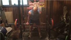 Heaviest Olympic Barbell Curl