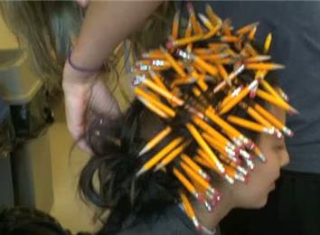 Most Pencils Stuffed Into Hair